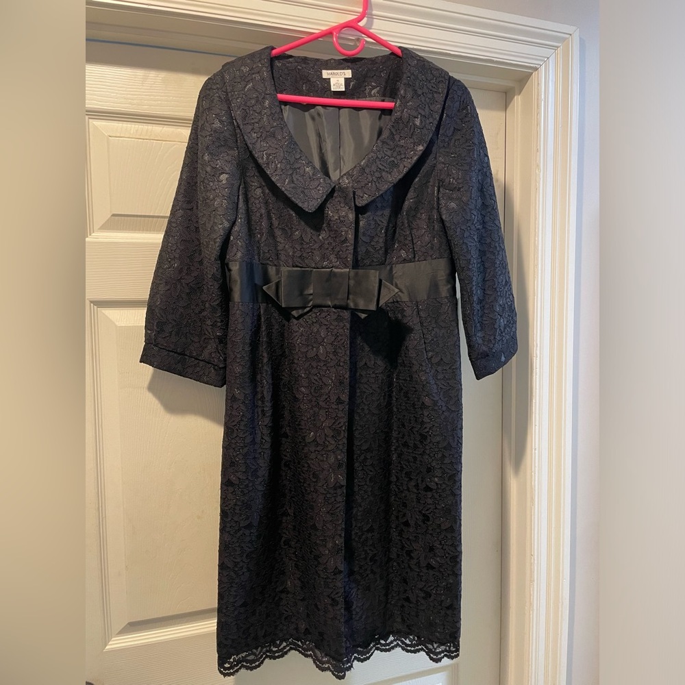 Harold's black lace coat